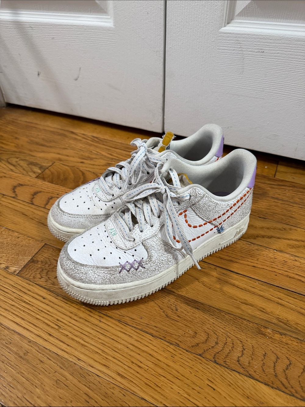 Nike White Low-Top Sneakers with Multicolor Stitching